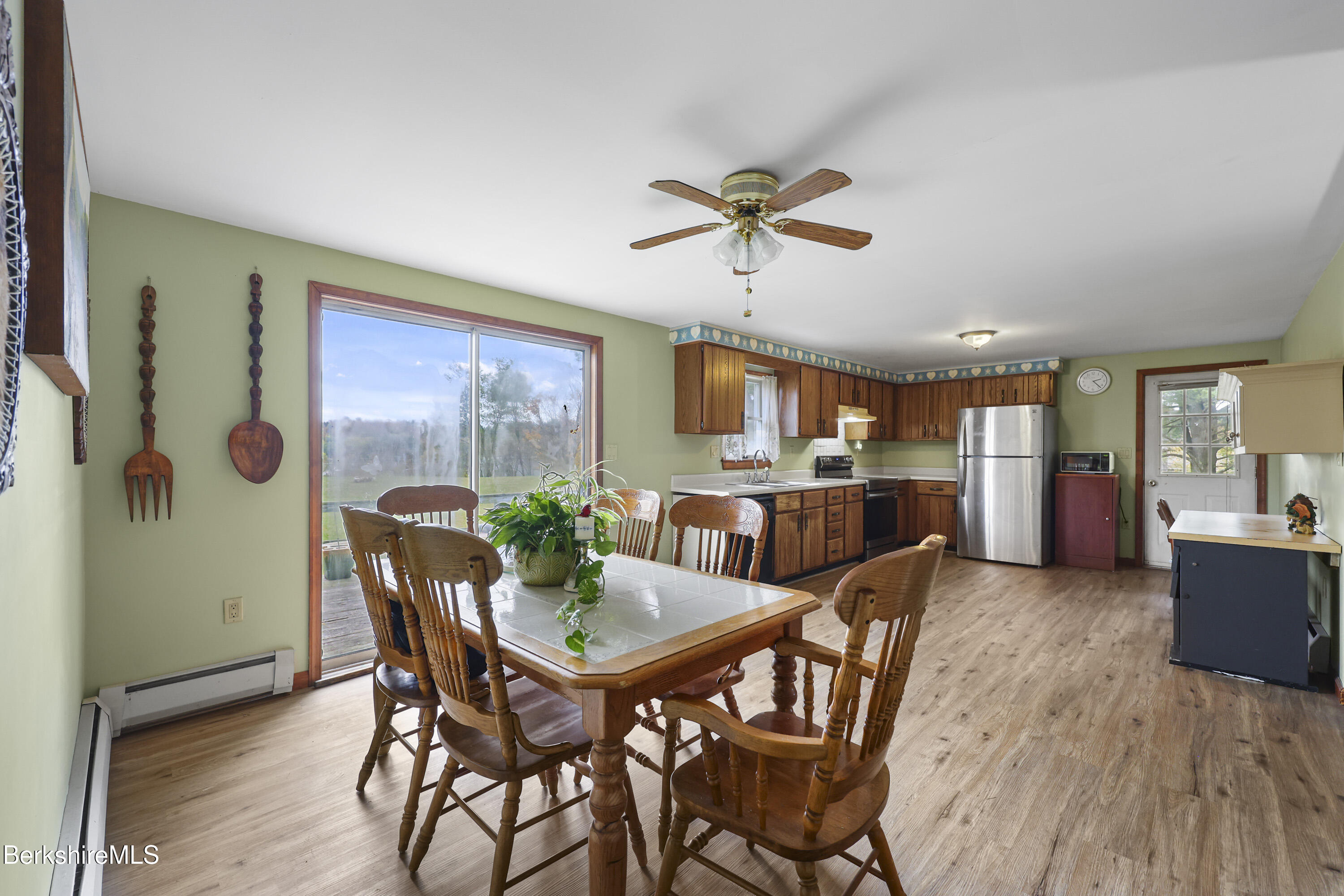 8 Samson Avenue Pittsfield, MA 01201 - Photo 11 of 55 a view of a dining room with furniture and a livingroom