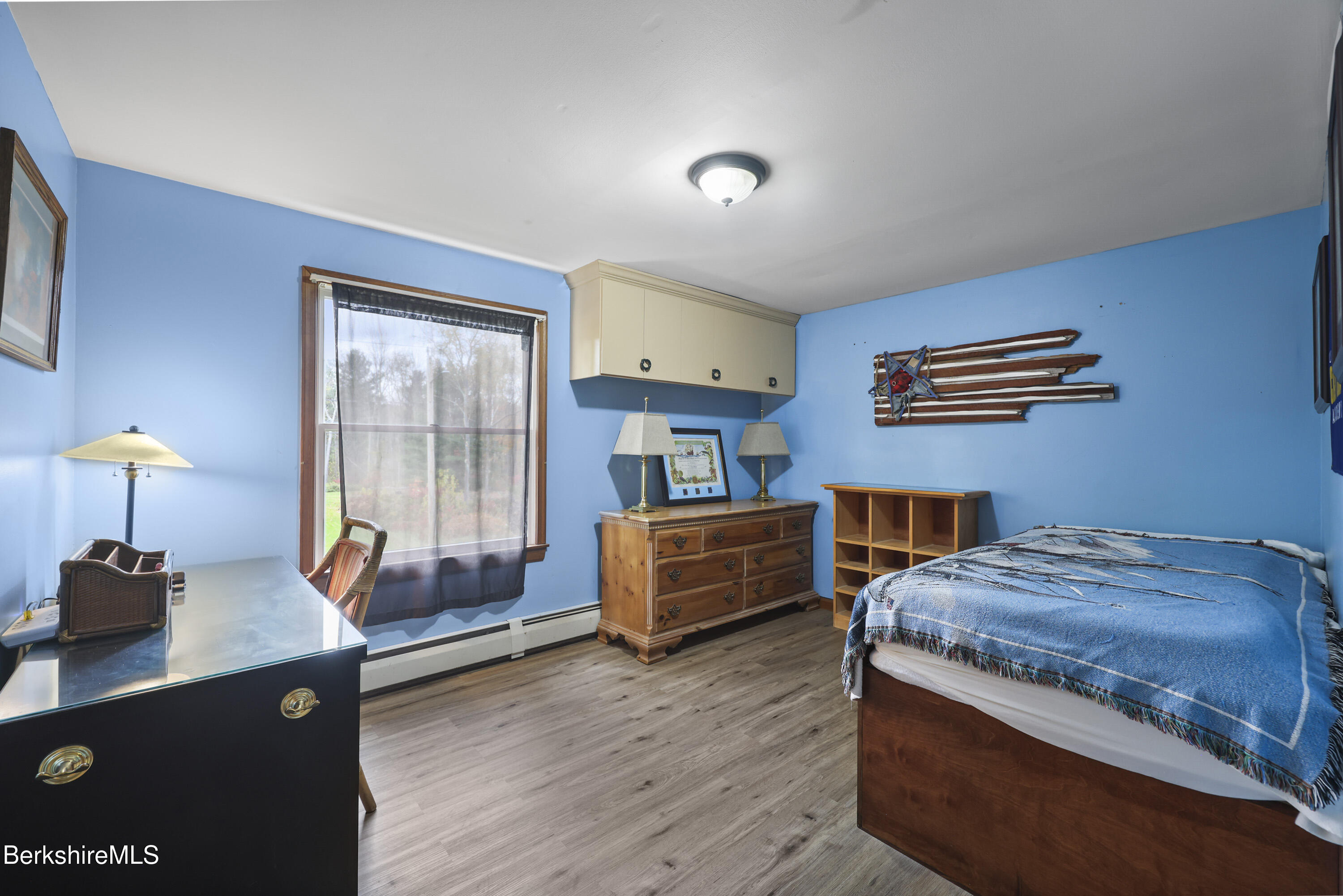 8 Samson Avenue Pittsfield, MA 01201 - Photo 15 of 55 a bedroom with a bed and a dresser