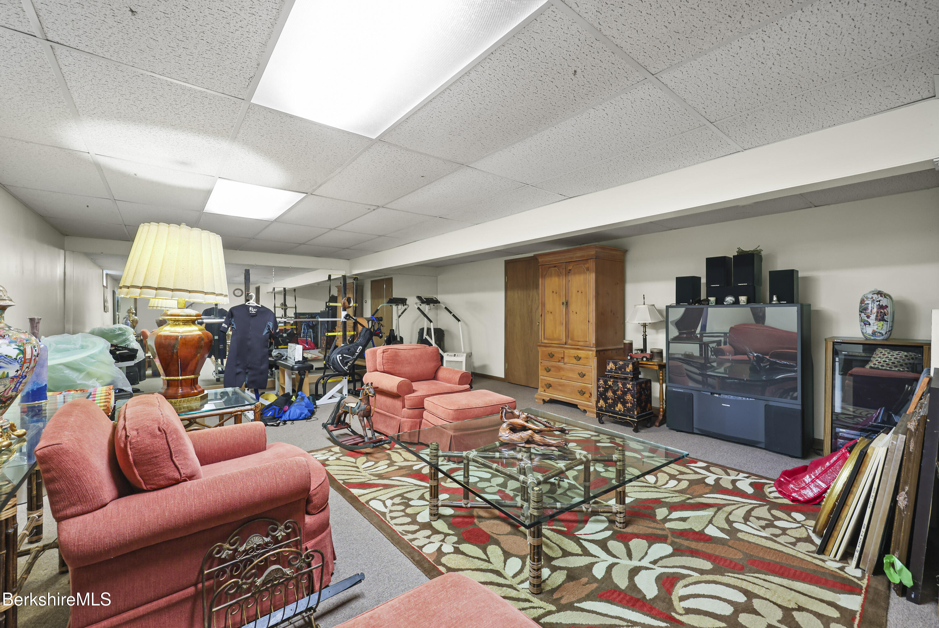 8 Samson Avenue Pittsfield, MA 01201 - Photo 22 of 55 a bed room with furniture and a flat screen tv