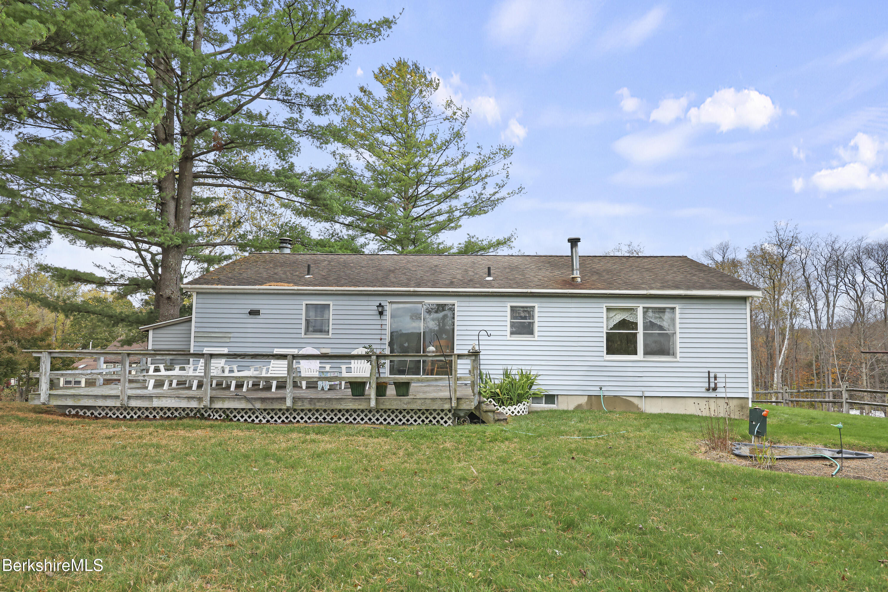 8 Samson Avenue Pittsfield, MA 01201 - Photo 29 of 55 a view of a house with a backyard patio and sitting area