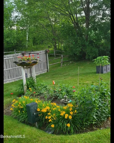 a garden view with a seating space