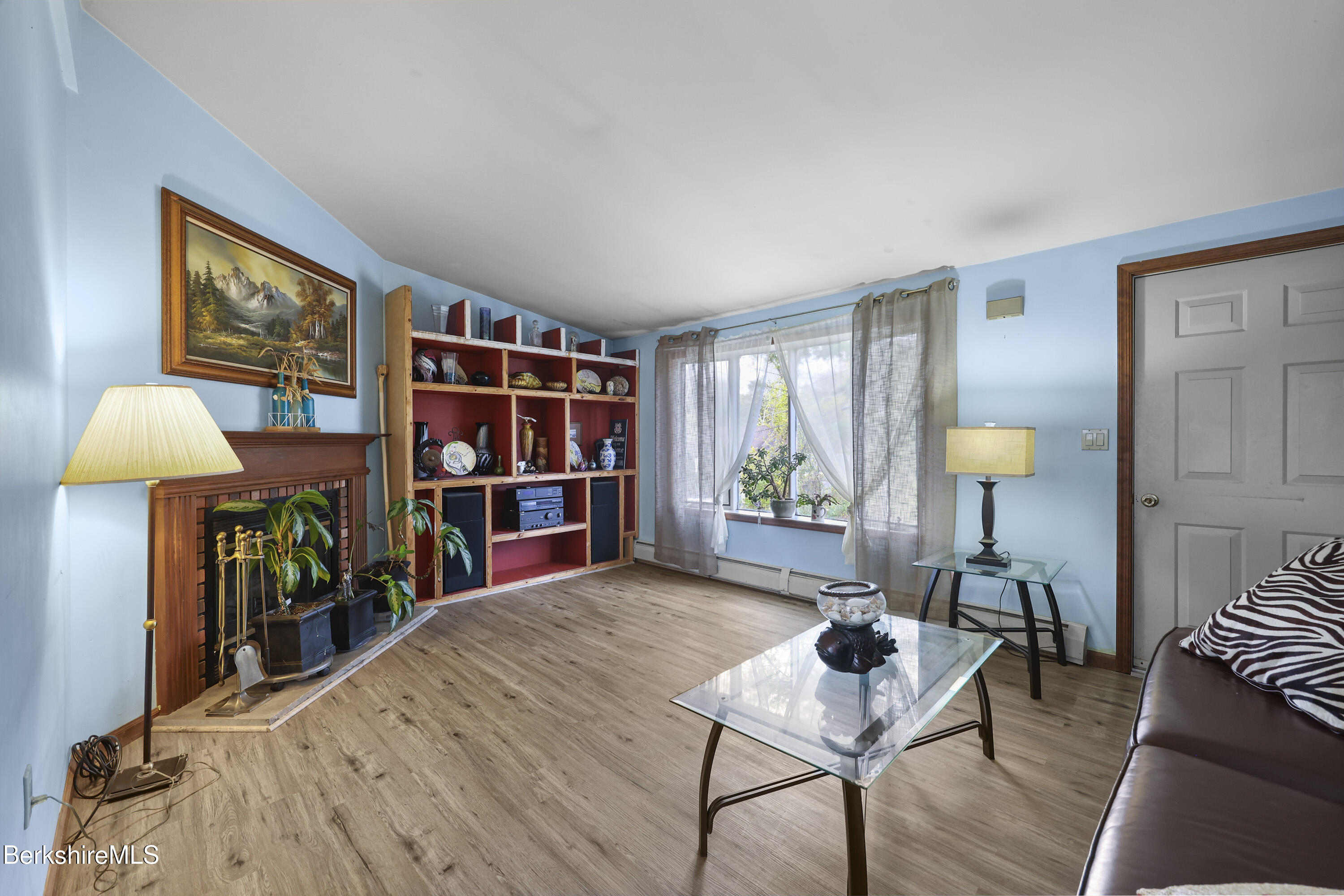 8 Samson Avenue Pittsfield, MA 01201 - Photo 10 of 55 a living room with furniture and a wooden floor