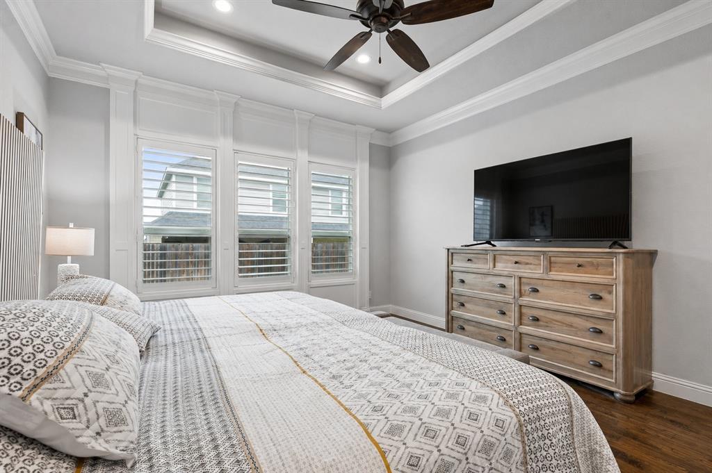 104 Ryder Court Hurst, TX 76053 - Photo 18 of 35 Designer Primary Suite With Custom Millwork And Plantation Shutters