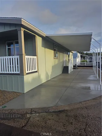 a view of a house with a street