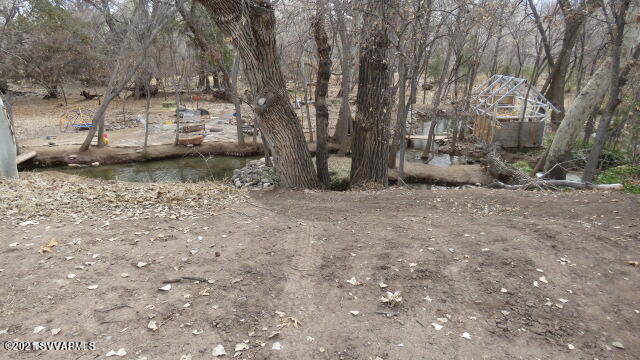 4275 East Aztec Road Rimrock, AZ 86335 - Photo 29 of 36 a view of a backyard with large trees
