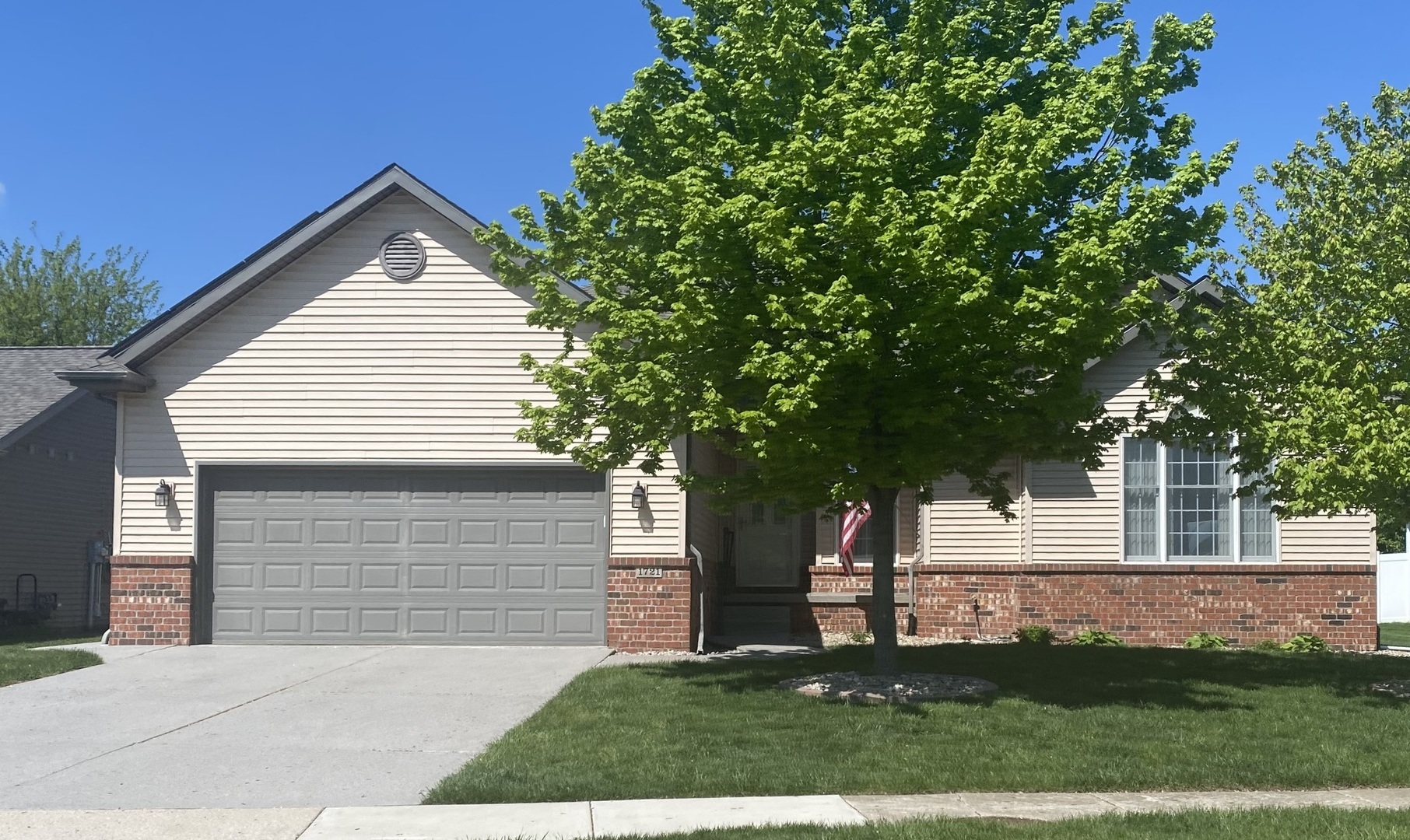 1721 Partridge Point Normal, IL 61761 - Photo 1 of 37 a front view of a house with a yard