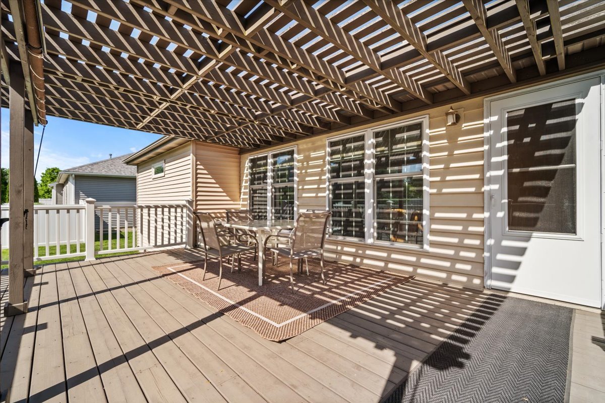 1721 Partridge Point Normal, IL 61761 - Photo 15 of 37 a view of balcony with wooden floor
