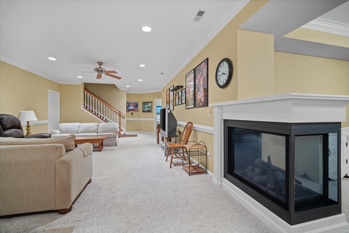 1721 Partridge Point Normal, IL 61761 - Photo 17 of 37 a living room with furniture and a fireplace
