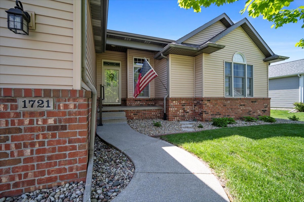 1721 Partridge Point Normal, IL 61761 - Photo 2 of 37 a front view of a house with garden