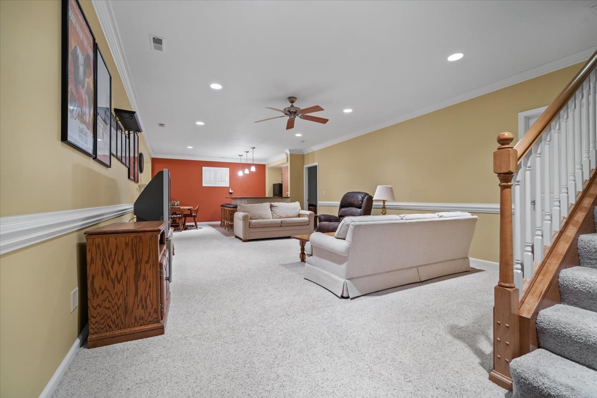 1721 Partridge Point Normal, IL 61761 - Photo 21 of 37 a living room with furniture and a ceiling fan