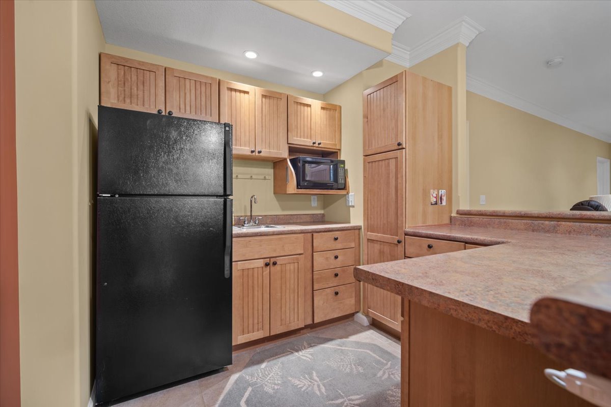 1721 Partridge Point Normal, IL 61761 - Photo 23 of 37 a kitchen with stainless steel appliances granite countertop a refrigerator and a sink