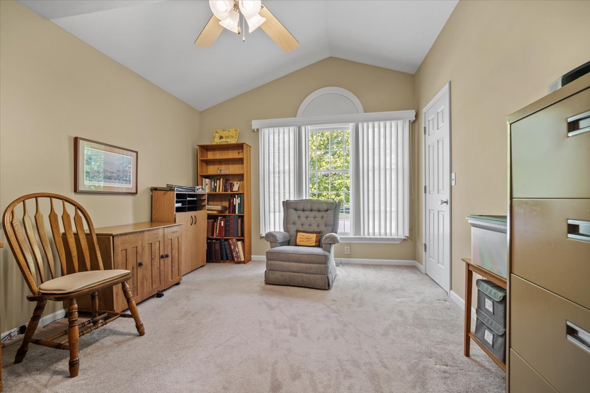 1721 Partridge Point Normal, IL 61761 - Photo 28 of 37 a living room with furniture and a large window