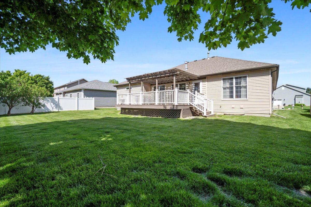 1721 Partridge Point Normal, IL 61761 - Photo 34 of 37 a front view of a house with a yard and trees