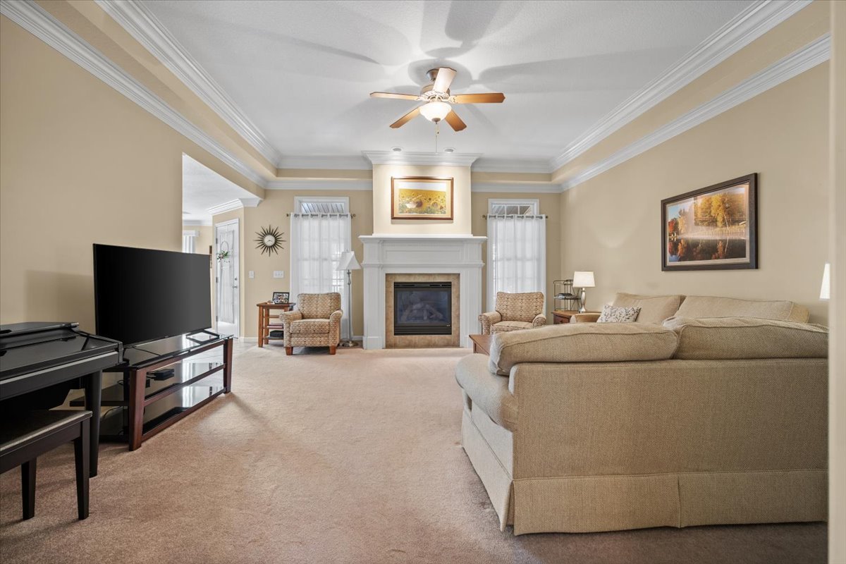 1721 Partridge Point Normal, IL 61761 - Photo 6 of 37 a living room with furniture and a flat screen tv