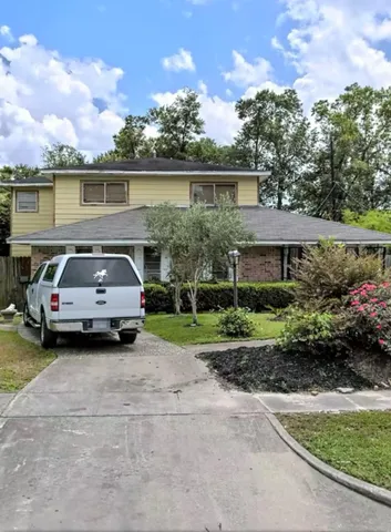 a car parked in front of a house