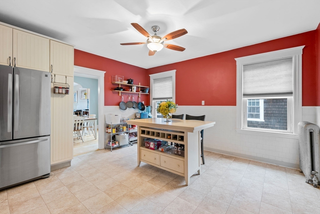 59 Leach Street, Unit 2 Salem, MA 01970 - Photo 14 of 38 a work room with furniture a ceiling fan and a window