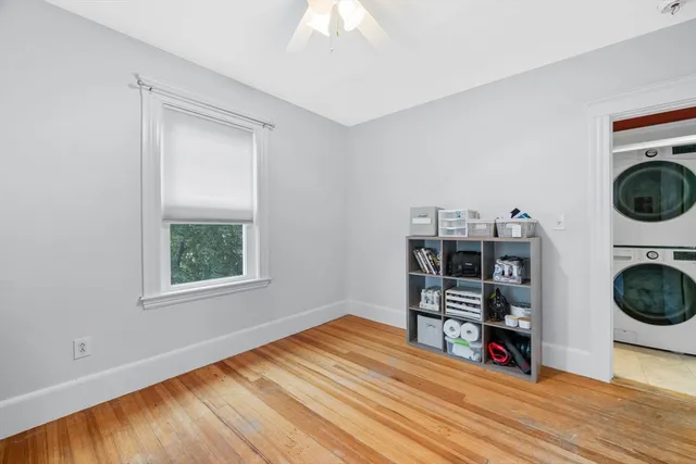 a view of a storage & utility room with wooden floor