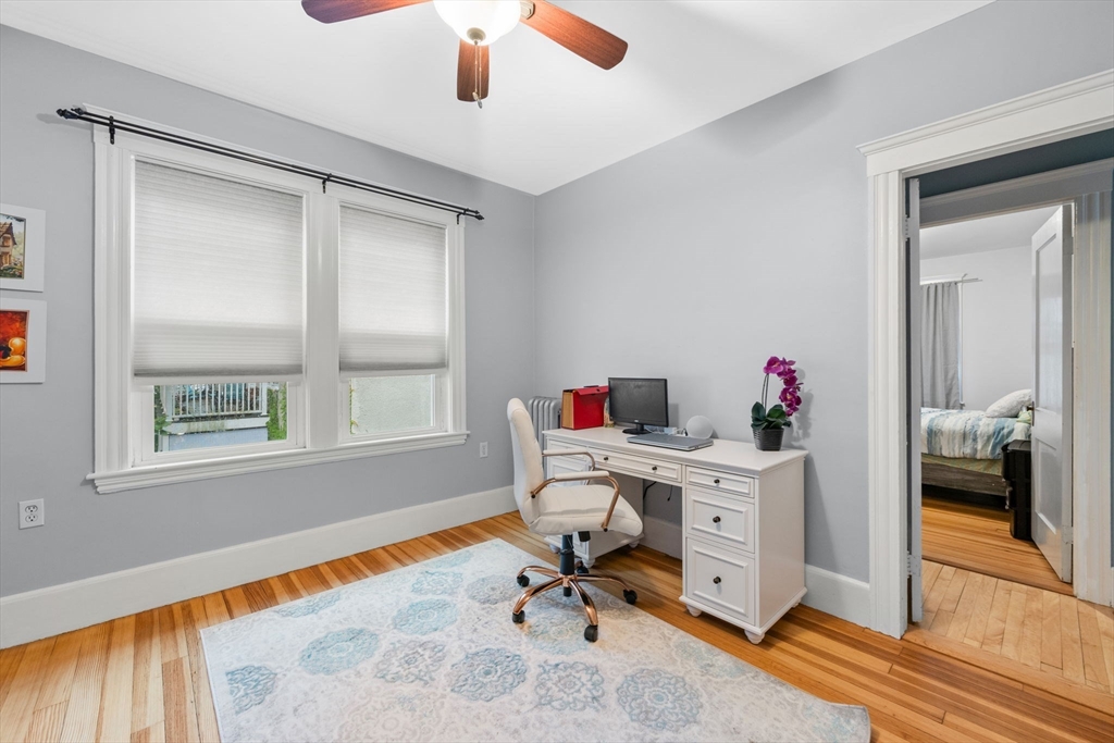 59 Leach Street, Unit 2 Salem, MA 01970 - Photo 23 of 38 a view of a workspace with furniture and a window