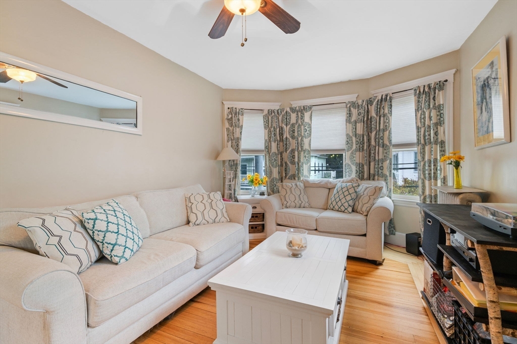 59 Leach Street, Unit 2 Salem, MA 01970 - Photo 10 of 38 a living room with furniture and a large window