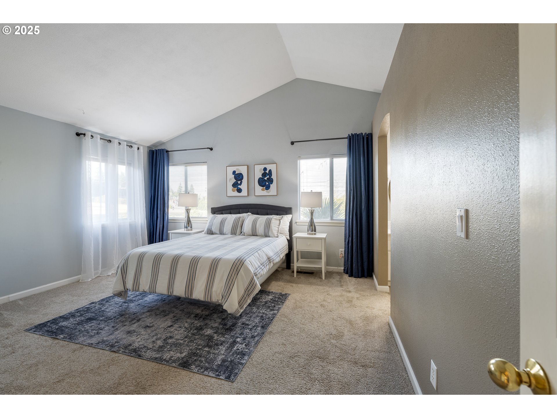 11450 Southwest Pintail Loop Beaverton, OR 97007 - Photo 16 of 35 a bedroom with a bed and a window