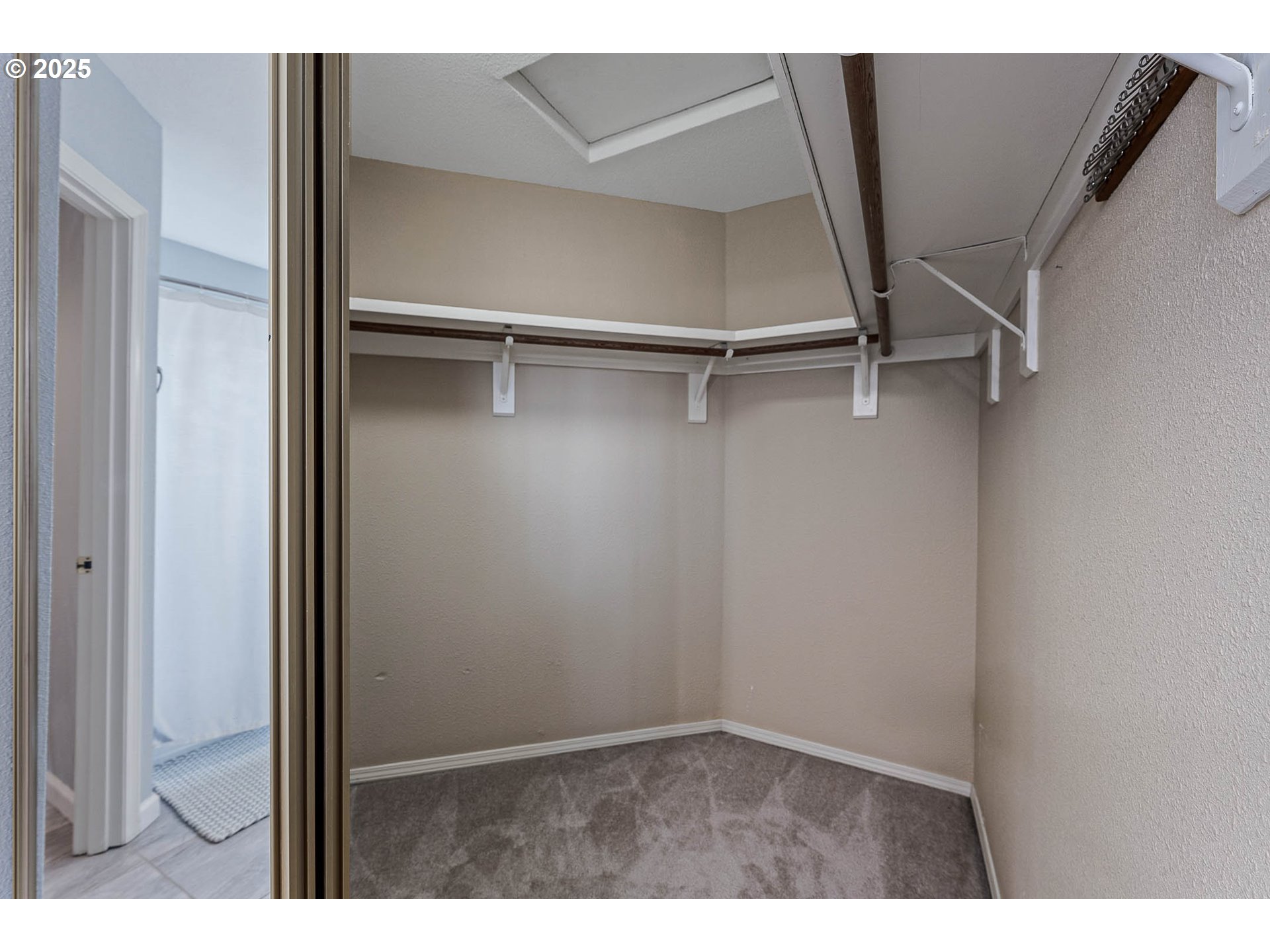 11450 Southwest Pintail Loop Beaverton, OR 97007 - Photo 22 of 35 a view of an empty walk in closet