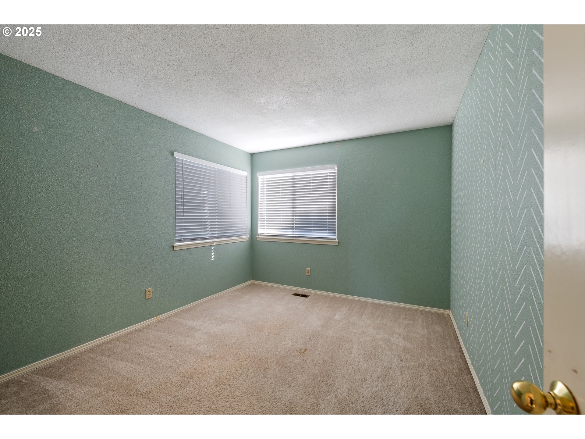 11450 Southwest Pintail Loop Beaverton, OR 97007 - Photo 23 of 35 a view of an empty room with a window