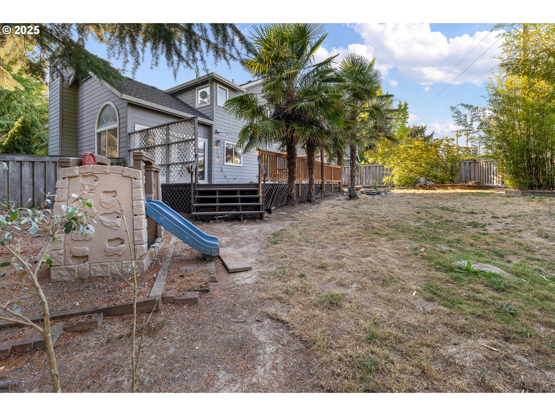11450 Southwest Pintail Loop Beaverton, OR 97007 - Photo 31 of 35 a view of a house with a backyard