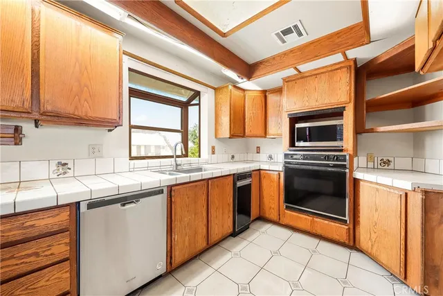 a view of swimming pool with a floor to ceiling window