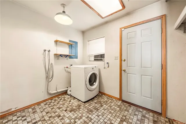 a kitchen with stainless steel appliances granite countertop a sink and a stove