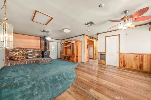 a view of a house with a yard and garage