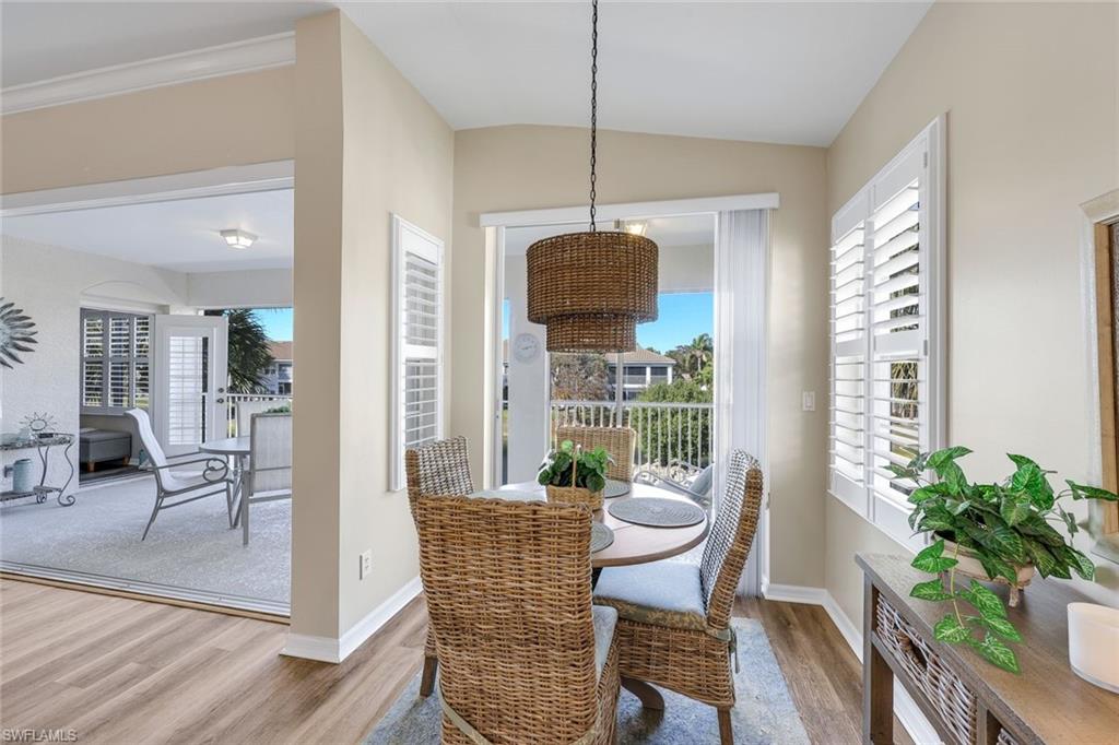 6879 Redbay Park Road, Unit 203 Naples, FL 34109 - Photo 12 of 43 Charming breakfast Area overlooking the lanai