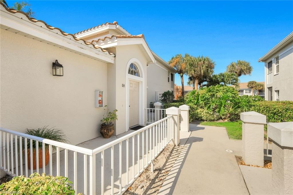 6879 Redbay Park Road, Unit 203 Naples, FL 34109 - Photo 3 of 43 Entrance to stairway to condo.