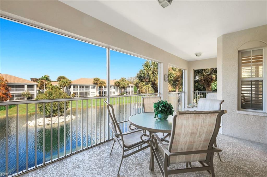 6879 Redbay Park Road, Unit 203 Naples, FL 34109 - Photo 30 of 43 Lanai featuring water view