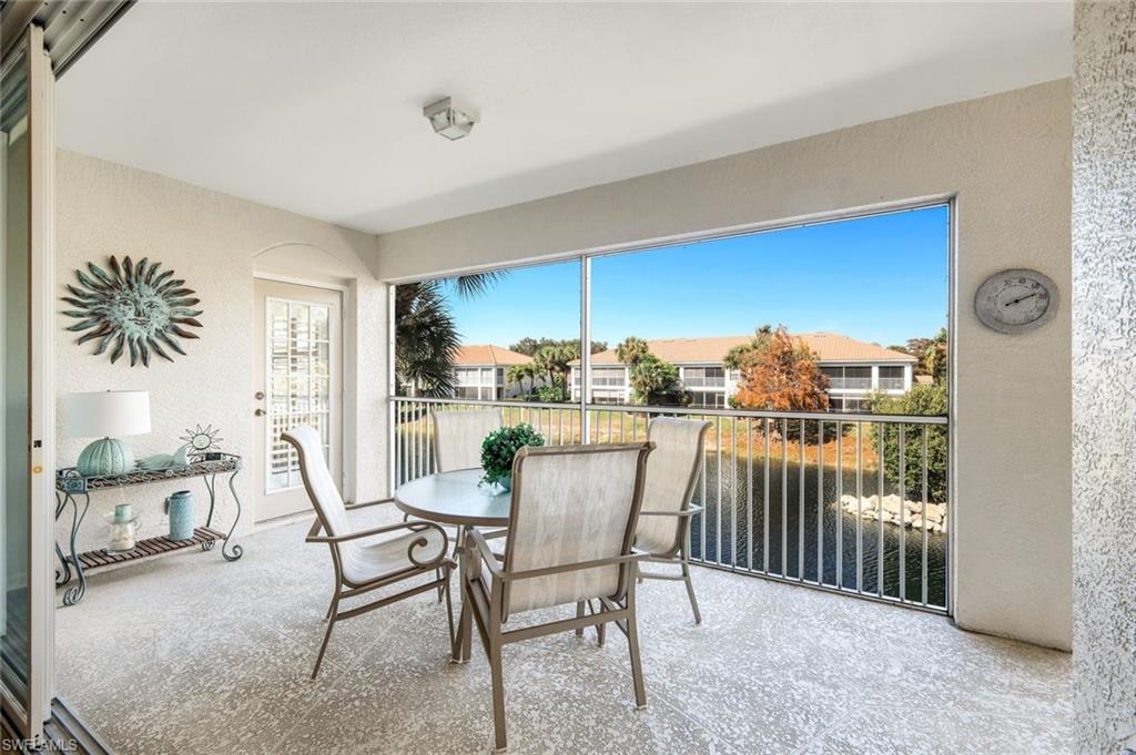 6879 Redbay Park Road, Unit 203 Naples, FL 34109 - Photo 31 of 43 Lanai overlooking water feature