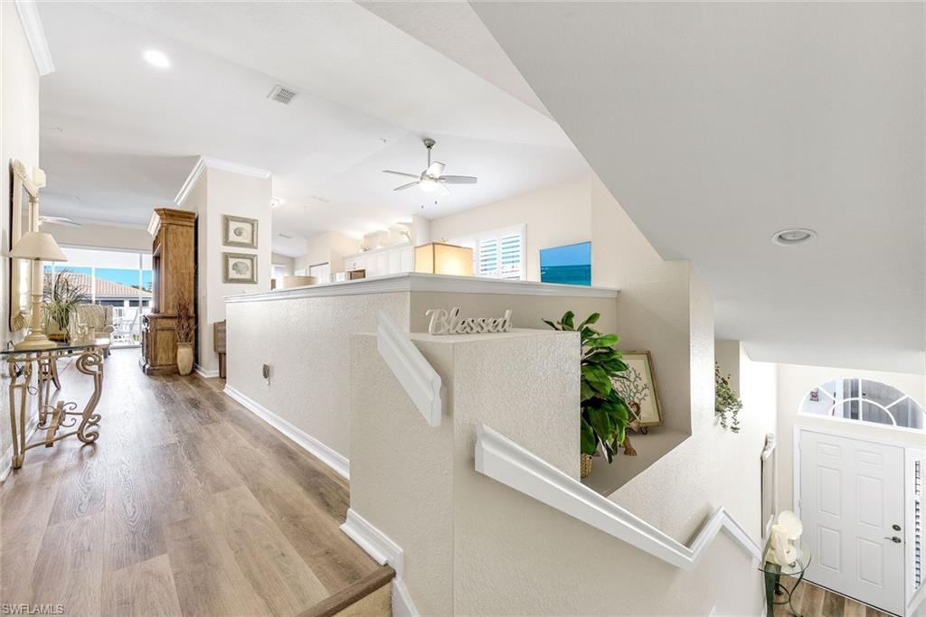 6879 Redbay Park Road, Unit 203 Naples, FL 34109 - Photo 6 of 43 Landing-entrance to living room & den