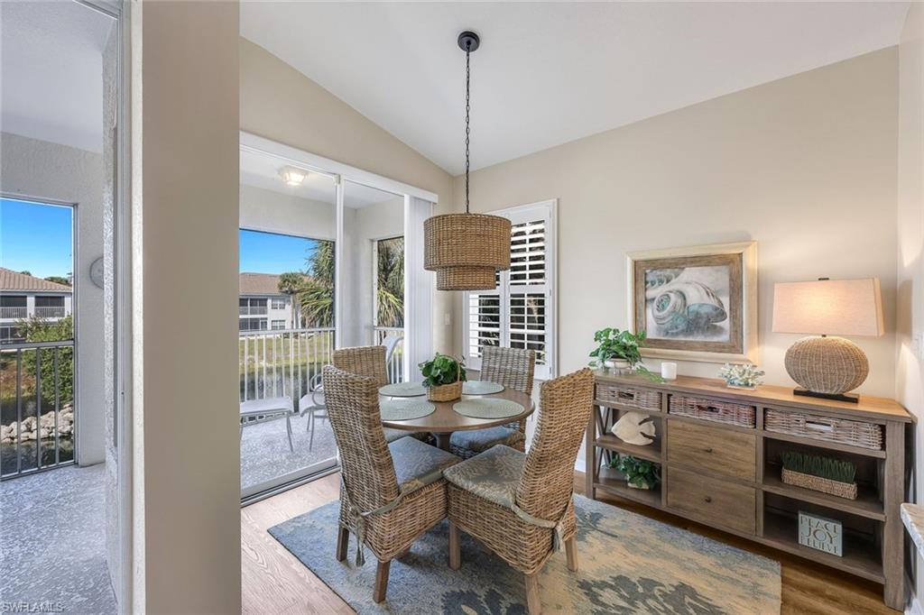 6879 Redbay Park Road, Unit 203 Naples, FL 34109 - Photo 10 of 43 Charming breakfast area overlooking lanai with water view