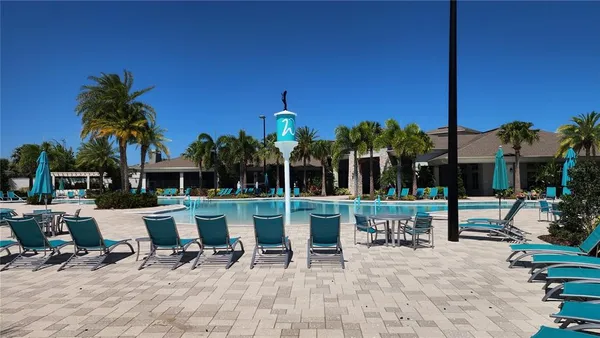 a view of a tables and chairs in patio