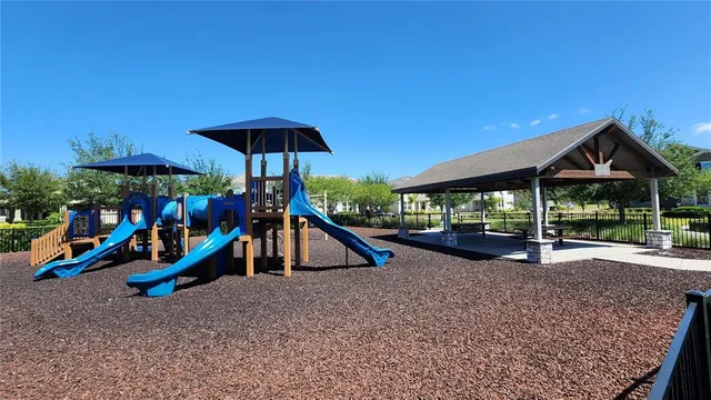 a view of a park with slide