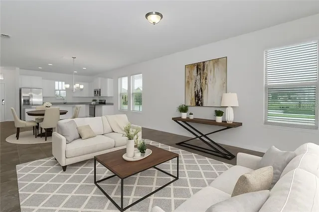 a living room with furniture and a table
