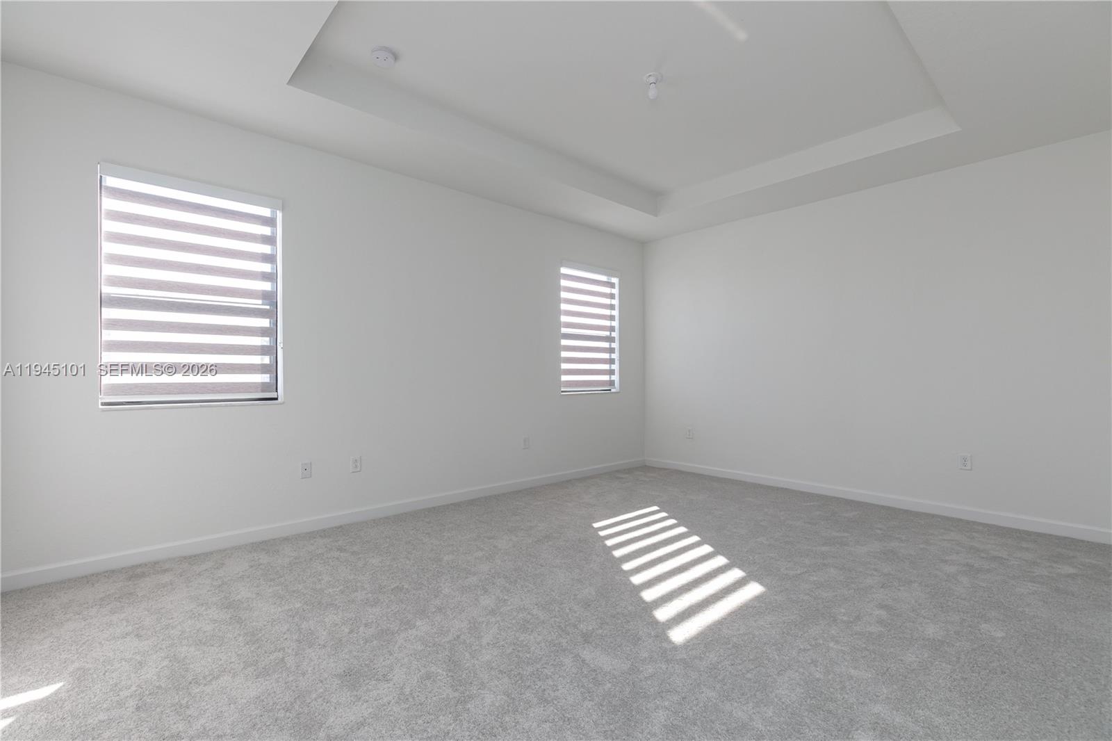 12990 Southwest 229th Lane Miami, FL 33170 - Photo 22 of 43 an empty room with windows