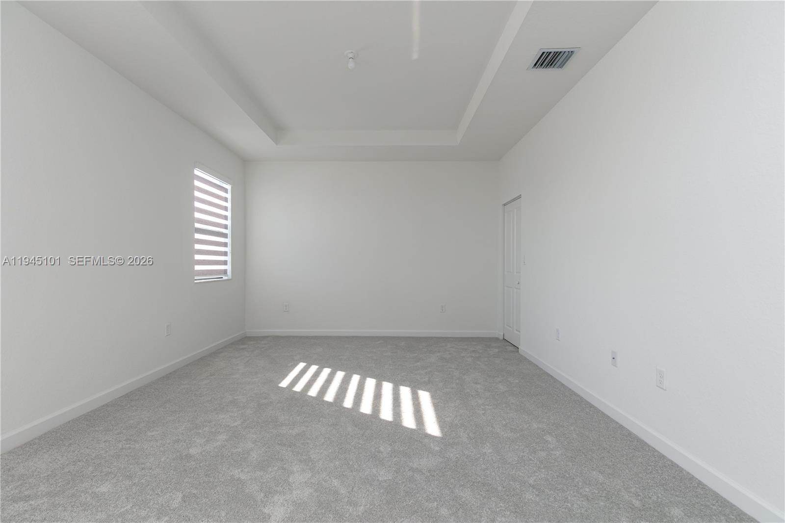 12990 Southwest 229th Lane Miami, FL 33170 - Photo 23 of 43 an empty room with a window