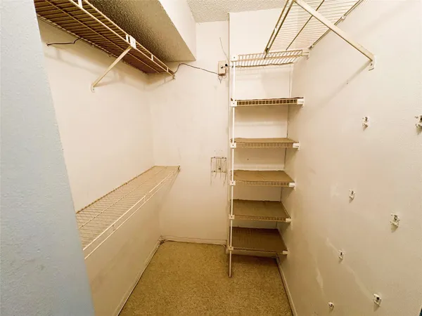 a room with rack on the wall