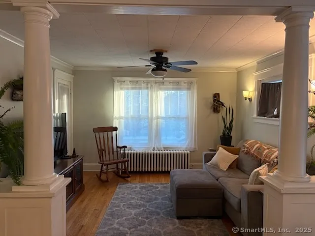 a living room with furniture and a window