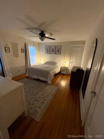 a view of a livingroom with wooden floor