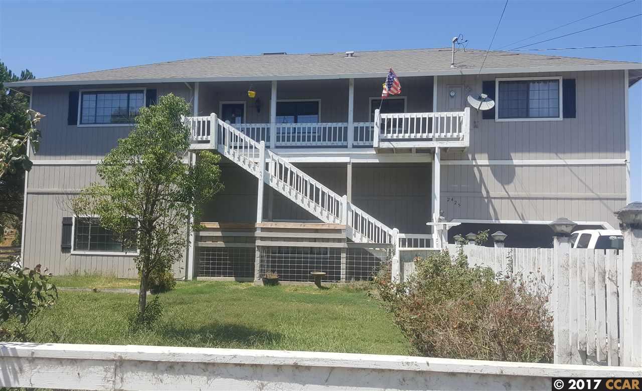 2425 Taylor Road Bethel Island, CA 94511 - Photo 1 of 1 plenty of yard with play structure, shade trees, roses and dog run