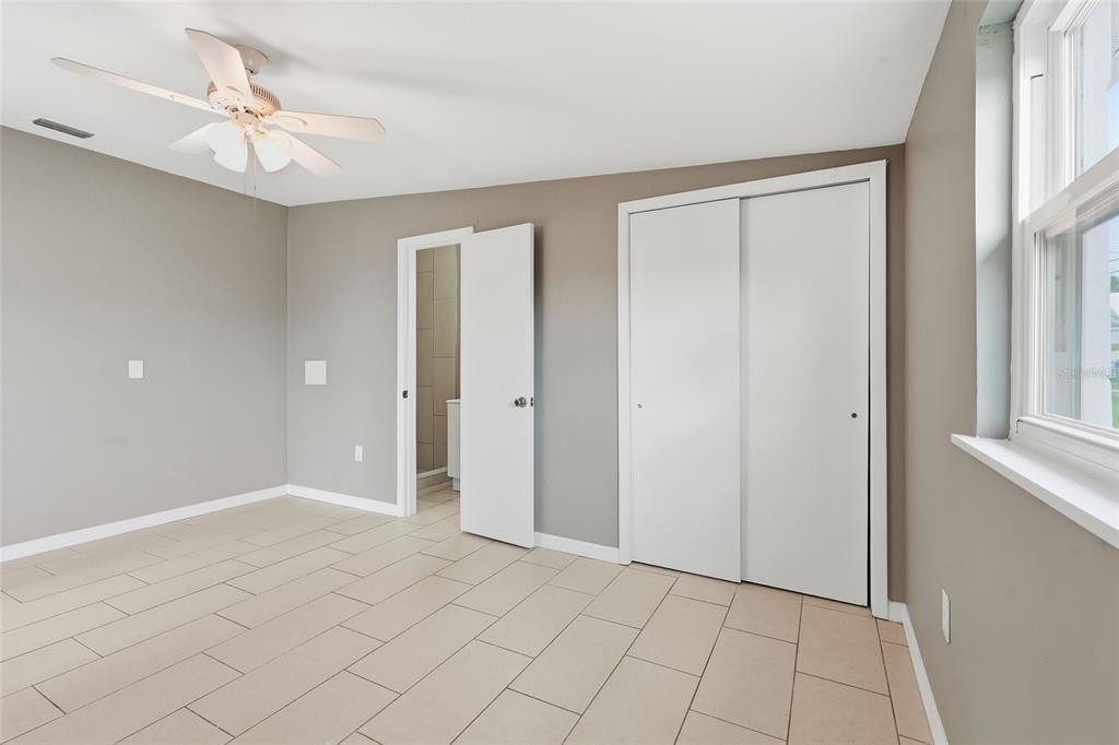 363 Glen Oak Road Venice, FL 34293 - Photo 29 of 53 a view of an empty room with a window