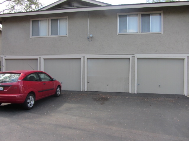935 Jamacha Road, Unit B El Cajon, CA 92019 - Photo 13 of 15 Second garage from the left (with red car in front) belongs to unit #B