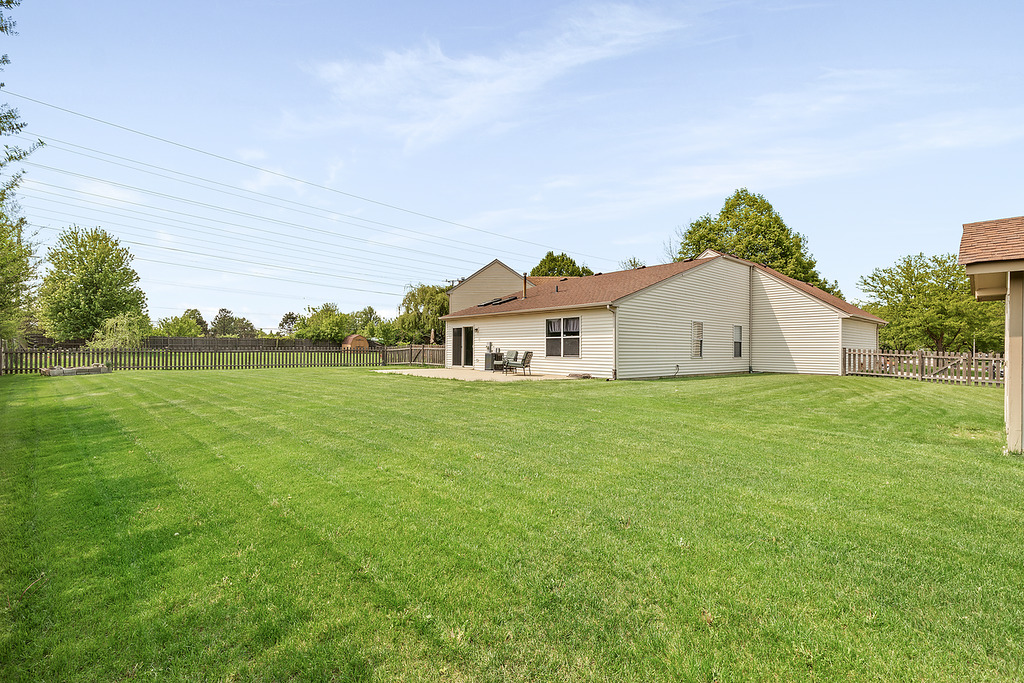 126 Dickens Trail Elgin, IL 60120 - Photo 22 of 23 a house view with a garden space
