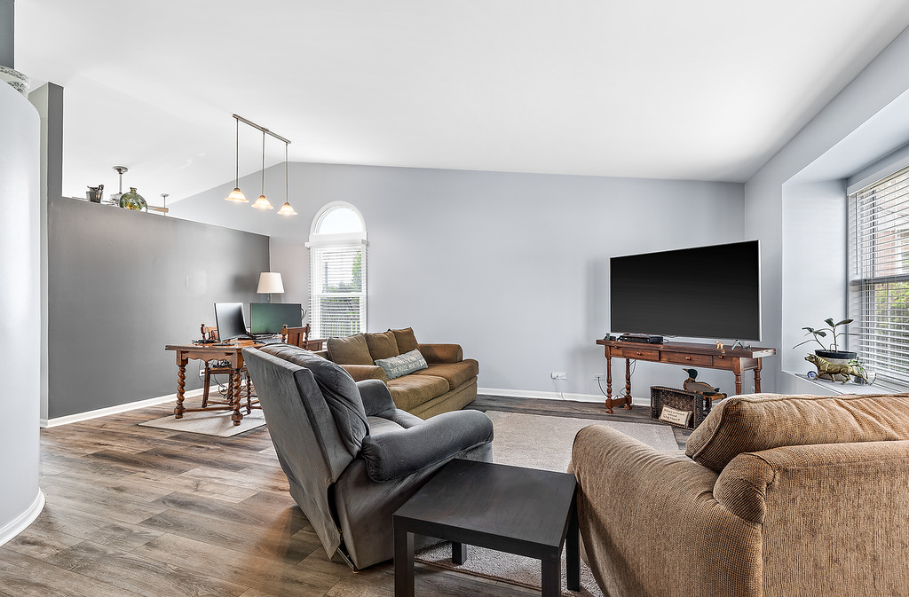126 Dickens Trail Elgin, IL 60120 - Photo 5 of 23 a living room with furniture and a flat screen tv