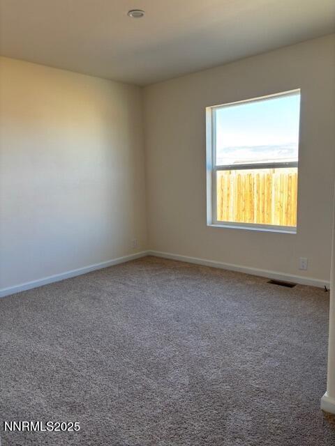 3599 Ardmore Street Silver Springs, NV 89429 - Photo 16 of 29 an empty room with a window